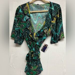 NWT Kiyonna Size 1 (1X) Ruffle Faux Wrap Top
Artistic, Contemporary yet Romantic
